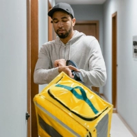 Man holding delivery bag